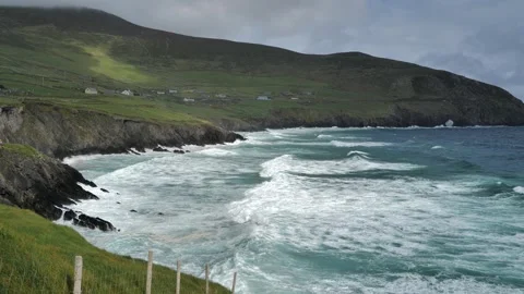 A view of waves from the Blasket Sound rushing towards the shore Stock Footage 340231691