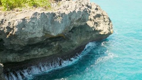 View on waves break on rock cliff Stock Footage 159330582