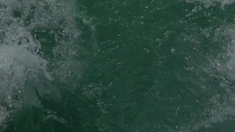 A view of the waves coming from the back of the ship Stock Footage 148931361