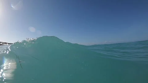 View of waves forming and moving towards the shore of a paradisiac island Vídeo Stock 150753219