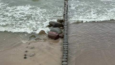A view of the waves of the gray Baltic Sea on a cloudy day 스톡 동영상 310682343