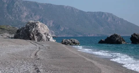 View of Waves Rolled at Sea Coast Line With Huge Rock Stock Footage 68775874