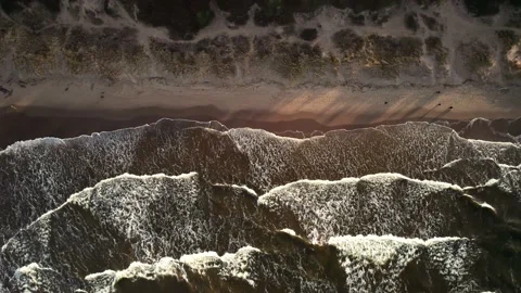 View on the waves of the sea, beautiful sandy beach of Latvia.4K aerial top view Stock-Footage 229257933