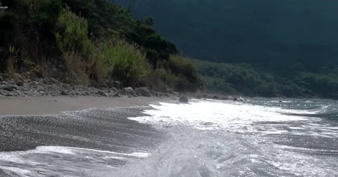 View of Waves at Sea Coast Line With Pier at Summer Day Video stock 69032697