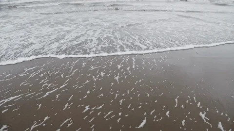 View of waves with sea foam on the beach in autumn. North sea coast, Slow Motion 스톡 동영상 119556228