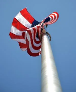 A view of a waving flag from a low angle Stock Photos