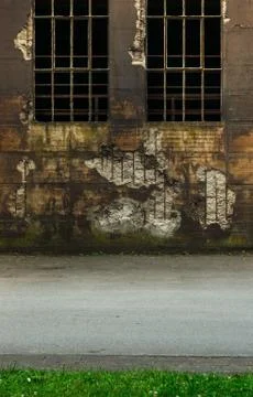 View at an weathered bunker wall with windows Foto stock