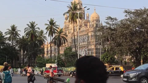 View of the Western Railway Head Office and road traffic in Mumbai, India Stock Footage 301420889
