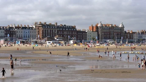 View of Weymouth beach and seafront with a low tide Stock Footage 118281390