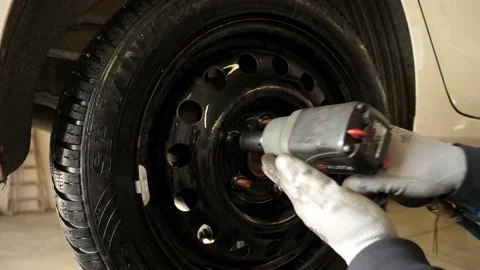 A view of a wheel change Stock-Footage 142691133