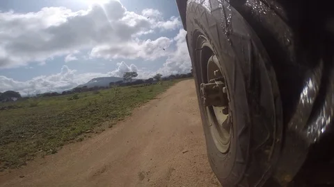 View from the wheel of the mud Geep Go PRO, Africa Stock Footage 126979472