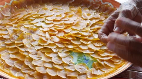 View while local people collect sweet mango paste from giant tray after dri.. Video stock 276353214