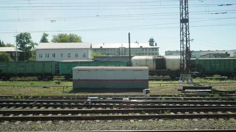 View of whistle stop from window of moving train. Train slow down and stops 스톡 동영상 115067155