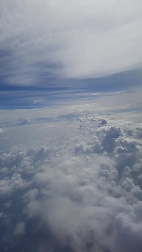 View of White Clouds from Airplane Window Vídeo Stock 331419157
