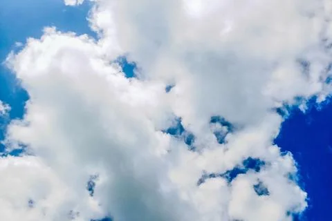 The view of white clouds and a clear and beautiful blue sky Stock Photos