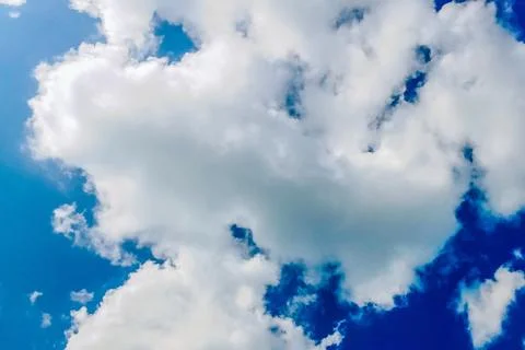 The view of white clouds and a clear and beautiful blue sky Stock Photos
