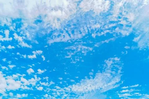 The view of white clouds and a clear and beautiful blue sky Stock Photos