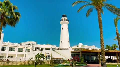 View of a White Lighthouse on the Spanish coastline, Catalonia. Mediterranean. Stock Footage 238830332