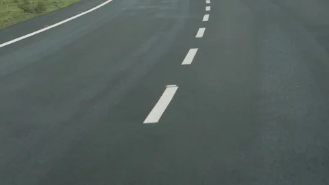 View of White Road Lines in the Center of the Road Stock Footage 303610983