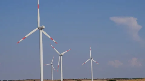 View of wind farm or wind park, with high wind turbines for generation electr Vídeo Stock 218619275