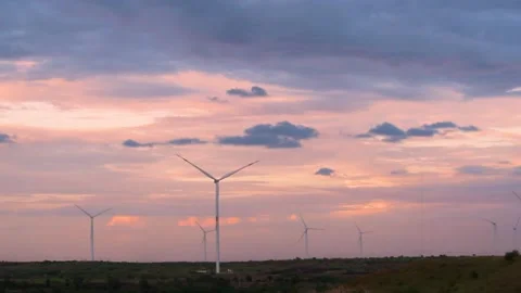 View of the windmills in windfarm during the sunset at Wankaner, Gujarat, India Stock Footage 134177979
