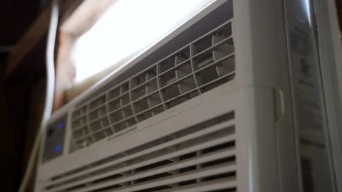 View of the Window Air Conditioner to Keep the Home Cool. Close up view Stock Footage 310976189