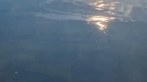 The view from the window of an air plane to the clouds, blue sunny sky. Stock Footage 278281152