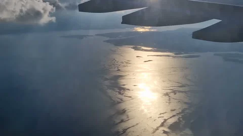 The view from the window of an air plane to the clouds, blue sunny sky. Stock Footage 278281648