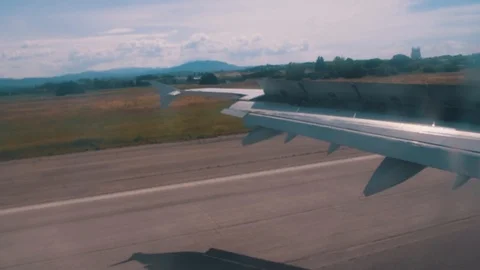 View from the window of the aircraft directly during takeoff. Rare footage Stock Footage 114521412