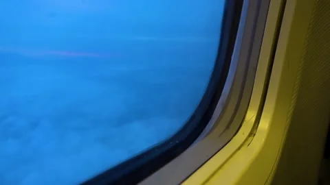 View from the window of the aircraft for evening clouds Stock Footage 179981511