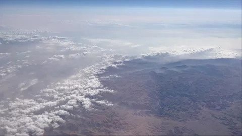 View from the window of the aircraft. Flight over beautiful african desert Stock Footage 244459292