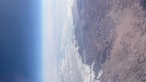 View from the window of the aircraft. Flight over beautiful african desert Stock Footage 244529885