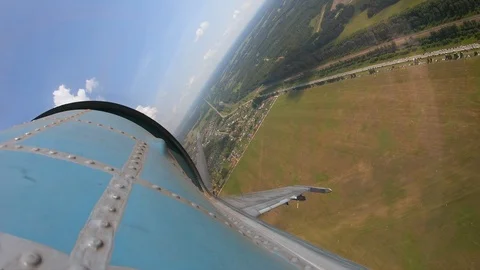 View from the window of the aircraft to the green fields. Plane is taking off. Stock Footage 120586209