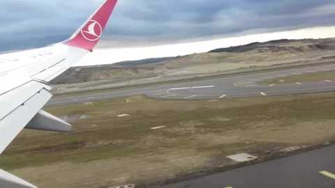 A view from the window of the aircraft taking off Stock Footage 283616601