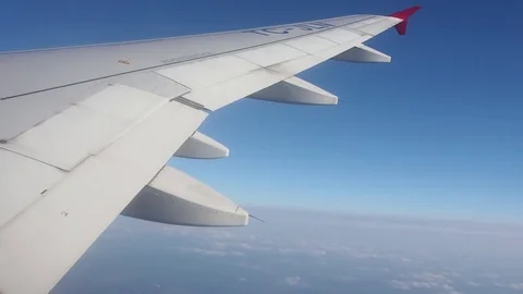View from the window aircraft at the wing, sky, horizon Video stock 73269336