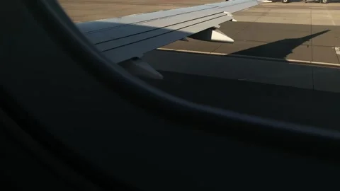 View from Window as Airplane Accelerates on Runway During Takeoff Stock Footage 318056422