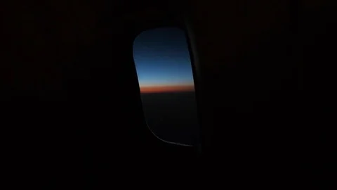View From Window of an Airplane During Sunset or Sunrise. Camera Zoom In. 스톡 동영상 84832403
