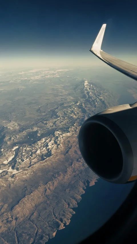 View from the window of an airplane in flight Stock Footage 308630045
