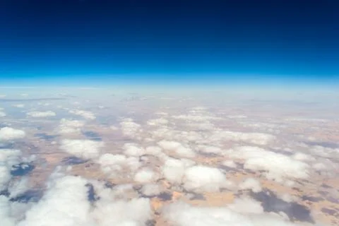 View from the window of an airplane flying Stock Photos