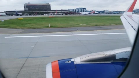View from the window of an airplane that has landed recently. Stock Footage 166313435