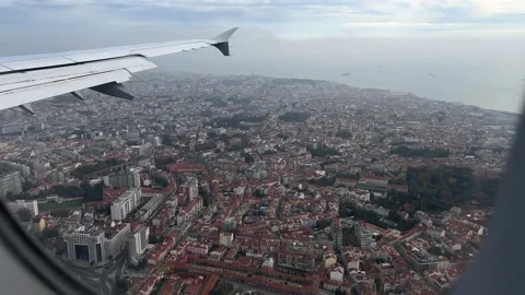View from window of airplane landing in Lisbon in December Stock Footage 226990949