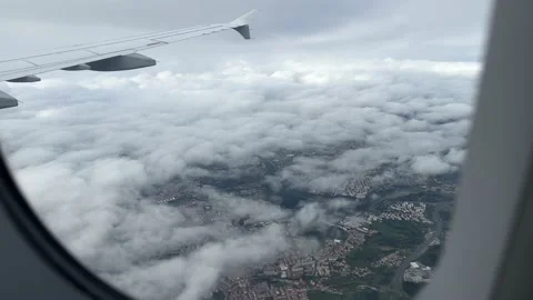 View from window of airplane landing in Lisbon in December Stock Footage 227488737