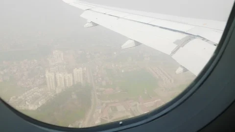 View of the window of airplane in Nepal over the Kathmandu. Stock Footage 91308119