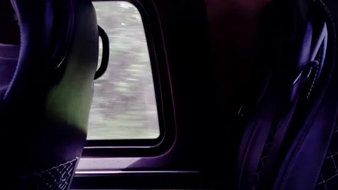 View of the window and seat in a minibus in motion. Copy space for text Stock Footage 303620978