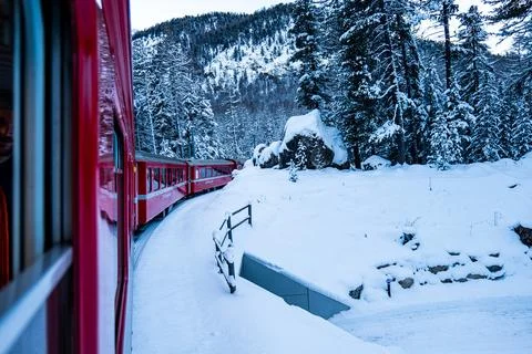 View from window of the Bernina Express train in the Alps in Switzerland. Stock Photos