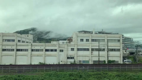 View from a window of a bullet train Shinkansen in Japan. Stock Footage 137640572