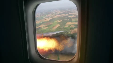 View from the window of a burning engine in falling plane. Video stock 142267201