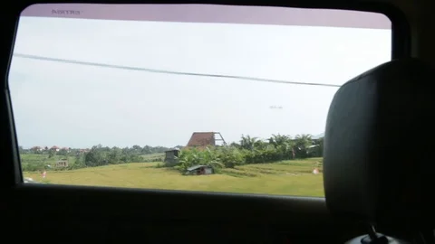 View from window of car in Bali Stock Footage 98938226