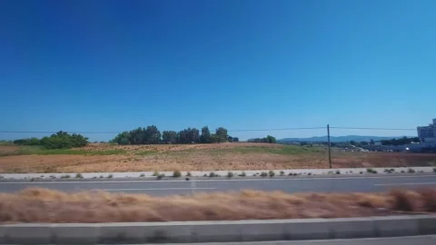 View from the window of a car in motion to the nature of Turkey, fields Stock Footage 305841073