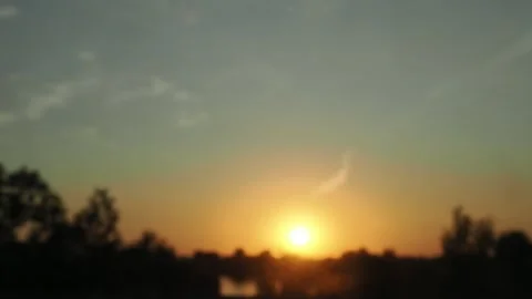 View from the window of a car moving along the road at sunset Stock Footage 286025966